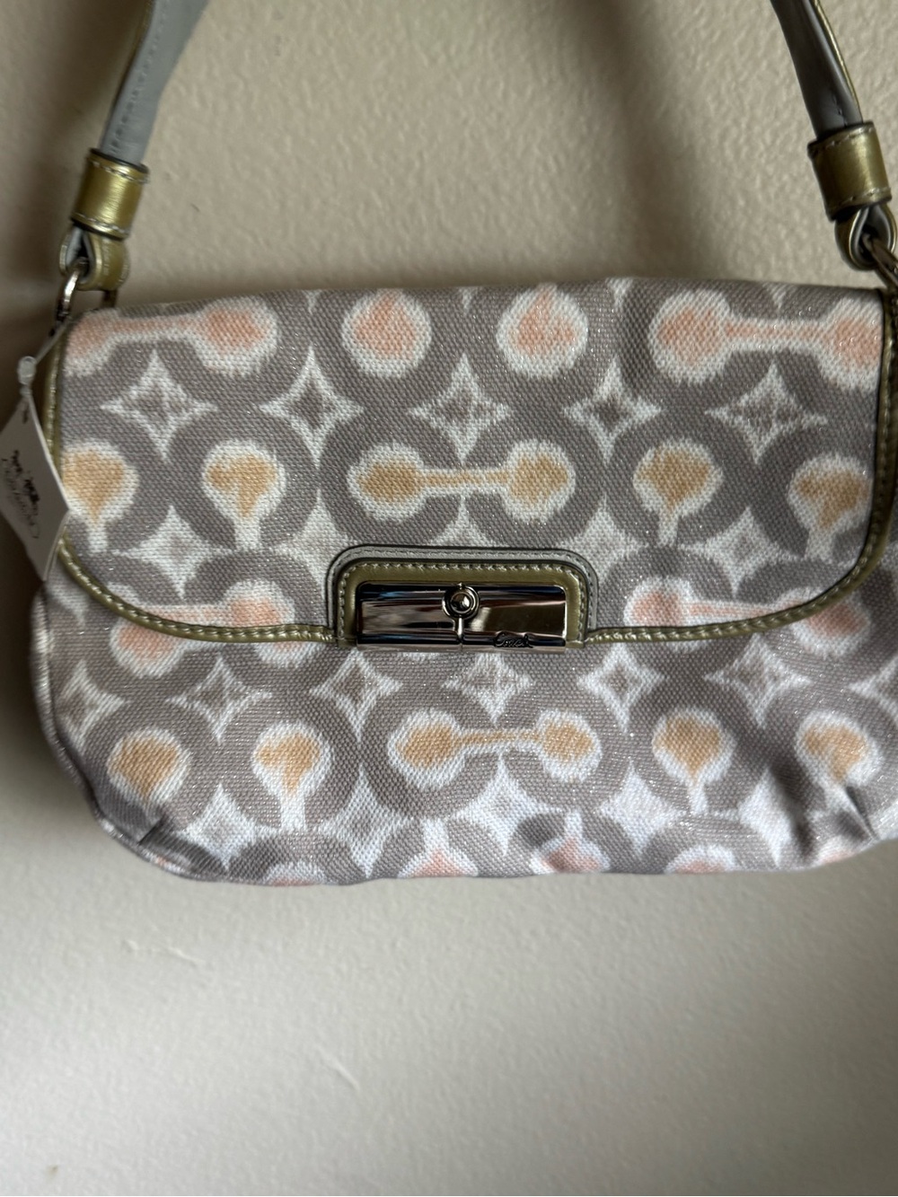 Coach signature op art